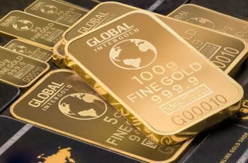 Ouro bate recorde histórico, puxado por Fed e demanda da China