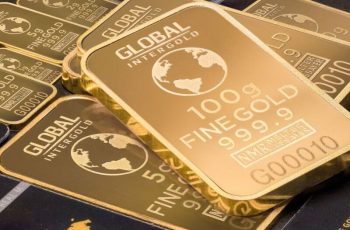 Ouro fecha em alta modesta, com dólar forte e perspectiva de juros do Fed