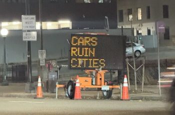 'Cars ruin cities' signs in Denver were hacked, officials say