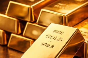 Cotação do ouro hoje em barras de ouro com valor recorde no mercado global.