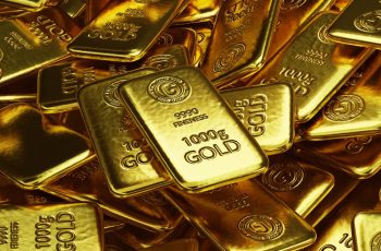 Ouro fecha em queda à espera de dados dos EUA