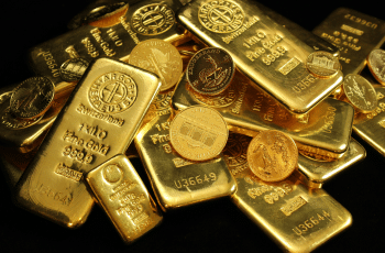 Ouro hoje cai com juros elevados e tensão no Oriente Médio pressiona mercados globais